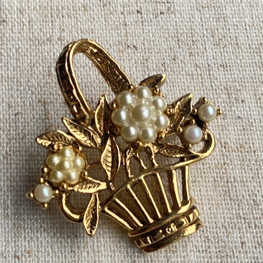 Vintage gold tone flower with basket brooch with seed pearls
